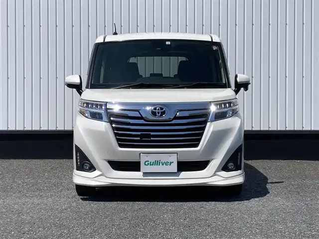 トヨタ ルーミー カスタムG－T 千葉県 2018(平30)年 2.1万km パールホワイトⅢ 純正9インチナビ/(フルセグTV/CD/DVD/BT/FM/AM)/バックカメラ/衝突被害軽減システム/クルーズコントロール/両側パワースライドドア/横滑り防止装置/アイドリングストップ/LEDヘッドライト/フォグランプ/オートライト/ウィンカーミラー/電動格納ミラー/純正15インチAW/シートリフター/プッシュスタート/スマートキー/フロアマット/スペアキー/取扱説明書/保証書
