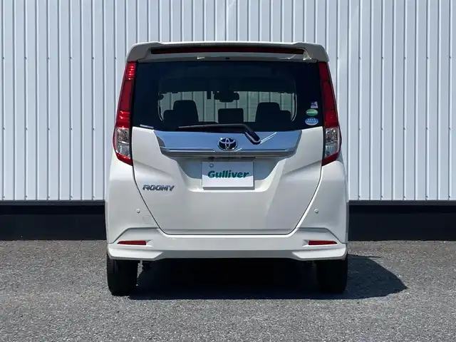 トヨタ ルーミー カスタムG－T 千葉県 2018(平30)年 2.1万km パールホワイトⅢ 純正9インチナビ/(フルセグTV/CD/DVD/BT/FM/AM)/バックカメラ/衝突被害軽減システム/クルーズコントロール/両側パワースライドドア/横滑り防止装置/アイドリングストップ/LEDヘッドライト/フォグランプ/オートライト/ウィンカーミラー/電動格納ミラー/純正15インチAW/シートリフター/プッシュスタート/スマートキー/フロアマット/スペアキー/取扱説明書/保証書
