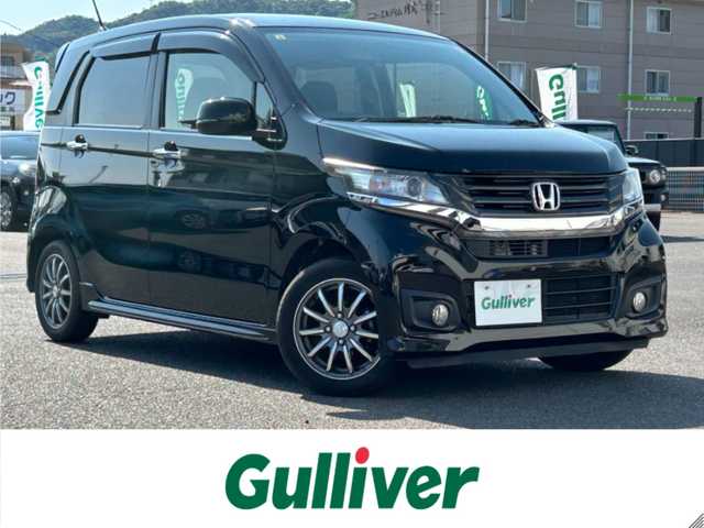 ホンダ Ｎ ＷＧＮ カスタム G 広島県 2014(平26)年 9.5万km スマートブラック ワンオーナー/純正メモリナビ(VXM-VSi)/　(Bluetooth/ワンセグテレビ/CD/DVD)/登録時走行距離/　94906km/バックカメラ/社外デジタルインナーミラー型ドライブレコーダー/オートライト/HIDヘッドライト/スマートキー/スペアキー/純正14インチアルミホイール/純正フロアマット/横滑り防止装置/保証書/取扱説明書