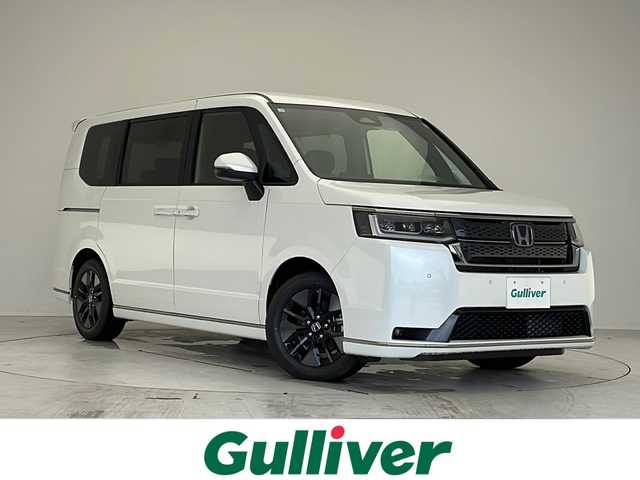 ホンダ ステップワゴン スパーダ eHEV 愛知県 2025(令7)年 0.1万km未満 プラチナホワイトパール 登録済未使用車/衝突軽減システム/純正１１．４型SDナビ/両側パワースライドドア/レーダークルーズコントロール/シートヒーター/フルセグ/CD/DVD/Bluetooth/バックカメラ/電動リアゲート/コーナーセンサー/純正アルミホイール/ブラインドスポットモニター/LEDヘッドライト/パドルシフト/オートマチックハイビーム/ステアリングスイッチ/スマートキー/プッシュスタート