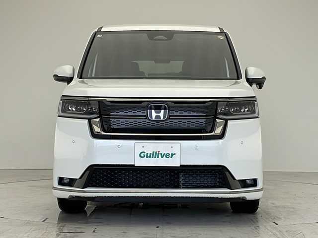 ホンダ ステップワゴン スパーダ eHEV 愛知県 2025(令7)年 0.1万km未満 プラチナホワイトパール 登録済未使用車/衝突軽減システム/純正１１．４型SDナビ/両側パワースライドドア/レーダークルーズコントロール/シートヒーター/フルセグ/CD/DVD/Bluetooth/バックカメラ/電動リアゲート/コーナーセンサー/純正アルミホイール/ブラインドスポットモニター/LEDヘッドライト/パドルシフト/オートマチックハイビーム/ステアリングスイッチ/スマートキー/プッシュスタート