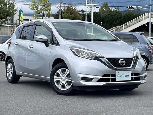 日産 ノート X 長野県 2017(平29)年 1.1万km ダークメタルグレー 社外ナビ/ETC/衝突軽減ブレーキ/レーンキープアシスト/オートライト/アイドリングストップ/AC/ヘッドライトレベライザー/スマートキー/ISOFIX/純正ホイールキャップ/電動格納ミラー/禁煙車