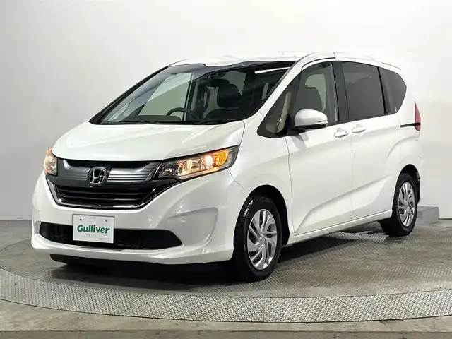 ホンダ フリード G ホンダセンシング 大阪府 2018(平30)年 3.8万km ホワイトオーキッドパール 純正ナビ　ワンセグＴＶ　Ｂｌｕｅｔｏｏｔｈ接続　バックカメラ　ＥＴＣ　衝突軽減　両側パワスラ　レーダークルコン　レーンアシスト　アイドリングストップ　スマートキー　オートライト　ＨＩＤヘッドライト