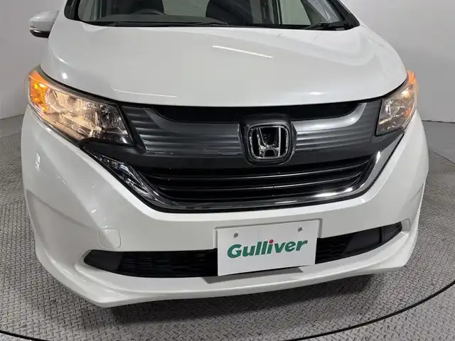 ホンダ フリード G ホンダセンシング 大阪府 2018(平30)年 3.8万km ホワイトオーキッドパール 純正ナビ　ワンセグＴＶ　Ｂｌｕｅｔｏｏｔｈ接続　バックカメラ　ＥＴＣ　衝突軽減　両側パワスラ　レーダークルコン　レーンアシスト　アイドリングストップ　スマートキー　オートライト　ＨＩＤヘッドライト