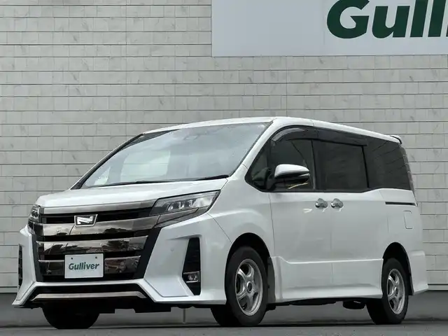 トヨタ ノア Si ダブルバイビーⅡ 岩手県 2019(平31)年 7万km ホワイトパールクリスタルシャイン 禁煙車/ワンオーナー/4WD/両側パワースライドドア/ハーフレザー/2列目サンシェード/純正ナビ/→フルセグTV/Bluetooth/CD/DVD/FM/AM/バックカメラ/衝突軽減システム/前後コーナーセンサー/横滑り防止装置/レーンキープアシスト/オートライト/オートハイビーム/LEDヘッドライト/フォグライト/〇プッシュスタート/〇電動格納ミラー/〇ウィンカーミラー/〇ドアバイザー/〇フロアマット/〇USBポート/〇シガーソケット/前後ドライブレコーダー/ビルトインETC