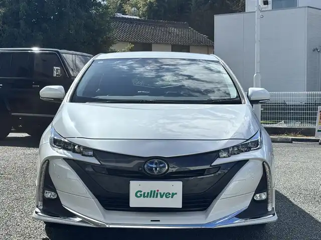 トヨタ プリウス ＰＨＶ A 熊本県 2020(令2)年 8.5万km プラチナホワイトパールマイカ ワンオーナー/モデリスタエアロ/社外ナビ（AVIC-RQ911）/【フルセグTV/Bluetooth/CD/DVD】/全方位カメラ/レーダークルーズコントロール/プリクラッシュセーフティー/レーンキープアシスト/コーナーセンサー/パーキングサポートブレーキ/ブラインドスポットモニター/オートLEDライト/オートハイビーム/社外１８インチAW（LEONIS）/【純正AW車載】/D席パワーシート/前席シートヒーター/革巻きステアリング/ステアリングスイッチ/プッシュスタート/スマートキー/ウィンカーミラー/ETC/ドライブレコーダー前後/純正フロアマット/社外ドアバイザー/充電ケーブル車載/保証書/取扱説明書/スペアキー
