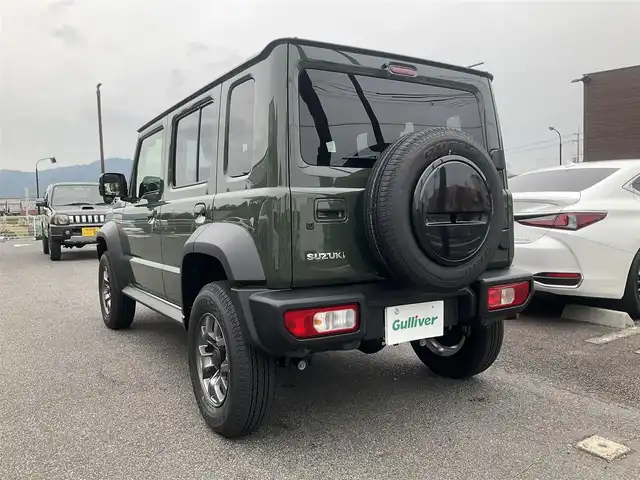 スズキ ジムニー ノマド FC 滋賀県 2025(令7)年 0.1千km 緑 登録済未使用車/車検10年10月まで/スズキセーフティーサポート/AT車/4WD/純正フロアマット/純正LEDヘッドライト/シートヒーター/取説/保証書/スペアキー