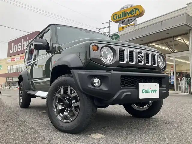 スズキ ジムニー ノマド FC 滋賀県 2025(令7)年 0.1千km 緑 登録済未使用車/車検10年10月まで/スズキセーフティーサポート/AT車/4WD/純正フロアマット/純正LEDヘッドライト/シートヒーター/取説/保証書/スペアキー