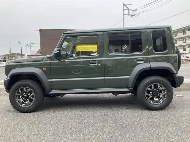 スズキ ジムニー ノマド FC 滋賀県 2025(令7)年 0.1千km 緑 登録済未使用車/車検10年10月まで/スズキセーフティーサポート/AT車/4WD/純正フロアマット/純正LEDヘッドライト/シートヒーター/取説/保証書/スペアキー