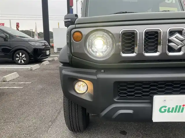 スズキ ジムニー ノマド FC 滋賀県 2025(令7)年 0.1千km 緑 登録済未使用車/車検10年10月まで/スズキセーフティーサポート/AT車/4WD/純正フロアマット/純正LEDヘッドライト/シートヒーター/取説/保証書/スペアキー