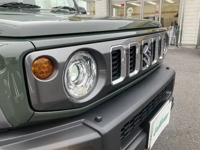 スズキ ジムニー ノマド FC 滋賀県 2025(令7)年 0.1千km 緑 登録済未使用車/車検10年10月まで/スズキセーフティーサポート/AT車/4WD/純正フロアマット/純正LEDヘッドライト/シートヒーター/取説/保証書/スペアキー