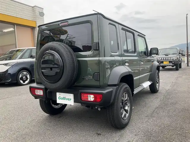 スズキ ジムニー ノマド FC 滋賀県 2025(令7)年 0.1千km 緑 登録済未使用車/車検10年10月まで/スズキセーフティーサポート/AT車/4WD/純正フロアマット/純正LEDヘッドライト/シートヒーター/取説/保証書/スペアキー