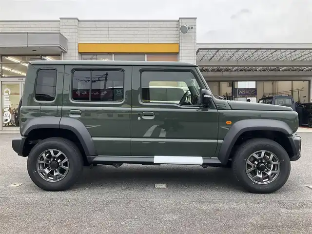 スズキ ジムニー ノマド FC 滋賀県 2025(令7)年 0.1千km 緑 登録済未使用車/車検10年10月まで/スズキセーフティーサポート/AT車/4WD/純正フロアマット/純正LEDヘッドライト/シートヒーター/取説/保証書/スペアキー