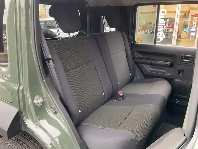 スズキ ジムニー ノマド FC 滋賀県 2025(令7)年 0.1千km 緑 登録済未使用車/車検10年10月まで/スズキセーフティーサポート/AT車/4WD/純正フロアマット/純正LEDヘッドライト/シートヒーター/取説/保証書/スペアキー