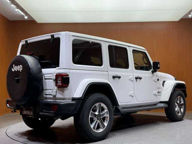 クライスラー・ジープ ジープ ラングラー アンリミテッド サハラ 千葉県 2019(令1)年 5.4万km ブライトホワイトクリアコート 純正ナビ　/バックカメラ　/ACC　/黒革シート　/シートヒーター　/レーンアシスト　/ブラインドスポット　/ステアリングヒーター　/コーナーセンサー　/スマートキー　/ETC　/ヒルディセントコントロール