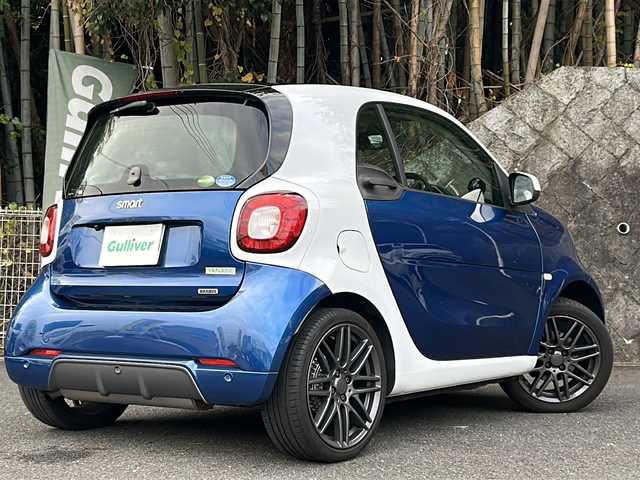 スマート ＭＣＣ スマート フォーツークーペ BRABUSスポーツ 京都府 2018(平30)年 4.3万km 白Ⅱ Panasonicナビ/・フルセグTV /BT Audio/バックカメラ/クルーズコントロール/ETC/ガラスルーフ/衝突軽減装置/車線逸脱防止装置/コーナーセンサー/アイドリングストップ/パドルシフト/シートヒーター/ステアリングスイッチ/純正フロアマット/保証書＆取説/ナビ取説/スペアキー