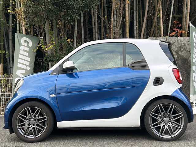 スマート ＭＣＣ スマート フォーツークーペ BRABUSスポーツ 京都府 2018(平30)年 4.3万km 白Ⅱ Panasonicナビ/・フルセグTV /BT Audio/バックカメラ/クルーズコントロール/ETC/ガラスルーフ/衝突軽減装置/車線逸脱防止装置/コーナーセンサー/アイドリングストップ/パドルシフト/シートヒーター/ステアリングスイッチ/純正フロアマット/保証書＆取説/ナビ取説/スペアキー