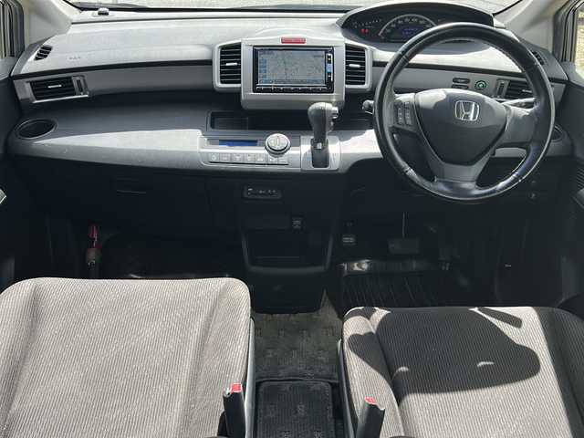 ホンダ フリード G ジャストセレクション 沖縄県 2014(平26)年 9.6万km モダンスティールM 禁煙車/純正ナビ　ワンセグＴＶ ＤＶＤ再生可　Ｂｌｕｅｔｏｏｔｈ/バックカメラ　/片側パワースライドドア　/ＨＩＤヘッドライト　/ＥＴＣ　　/オートライト　/横滑り防止装置　/スマートキー