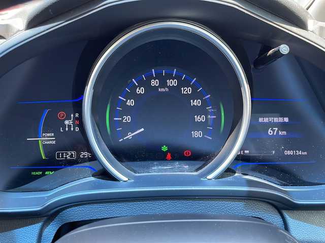 ホンダ フィット ハイブリット Lパッケージ 道央・札幌 2016(平28)年 8.1万km アラバスターシルバーメタリック 純正ナビ(BT、SD、DVD、CD、TV)/純正フロアマット/横滑り防止/オートライト/バックカメラ/プッシュスタート/ワンセグテレビ/衝突被害軽減装置/電格ミラー