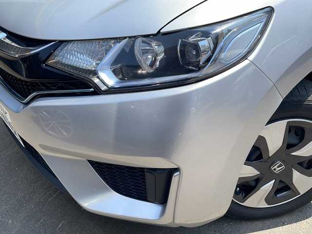 ホンダ フィット ハイブリット Lパッケージ 道央・札幌 2016(平28)年 8.1万km アラバスターシルバーメタリック 純正ナビ(BT、SD、DVD、CD、TV)/純正フロアマット/横滑り防止/オートライト/バックカメラ/プッシュスタート/ワンセグテレビ/衝突被害軽減装置/電格ミラー