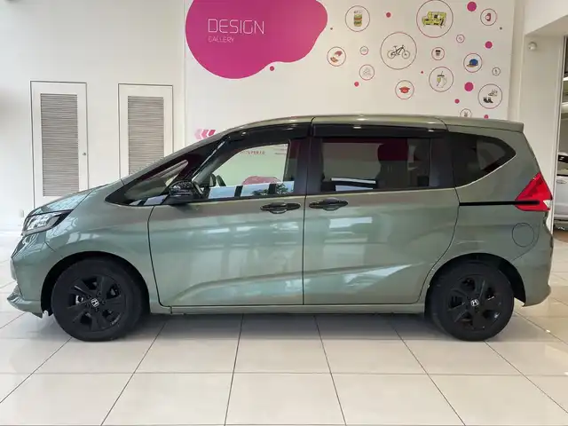 ホンダ フリード G ブラックスタイル 埼玉県 2022(令4)年 2.5万km シルバーミストグリーンM ホンダセンシング/社外SDナビ/　CD/DVD/BT/フルセグ/バックカメラ/両側パワースライドドア/レーダークルーズコントロール/レーンキープアシスト/シートヒーター/純正15インチアルミホイール/オートライト/アイドリングストップ/スマートキー/禁煙車
