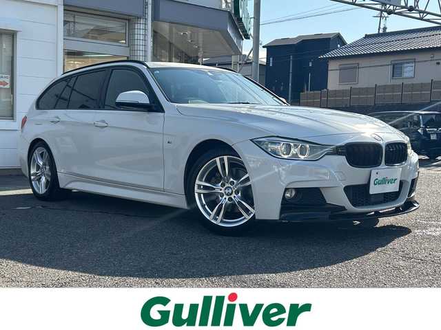 ＢＭＷ ３２０ｄ ツーリング Mスポーツ 愛知県 2015(平27)年 7.9万km アルピンホワイトⅢ ・禁煙車/・フロントリップスポイラー/・純正HDDナビ/・Bluetooth/・CD/DVD/・ドライブレコーダー/・バックカメラ/・ETC/・インテリジェントセーフティ/・ブレーキ機能付き警告/・レーンディパーチャーウォーニング/・アダプティブクルーズコントロール/・パークディスタンスコントロール（コーナーセンサー）/・前席パワーシート/・HIDオートライト/・電動格納ミラーウィンカー/・フロアマット/・ルーフレール/・純正１８インチアルミ/・パワーバックドア/・新車保証書/・取扱説明書/・スペアキー