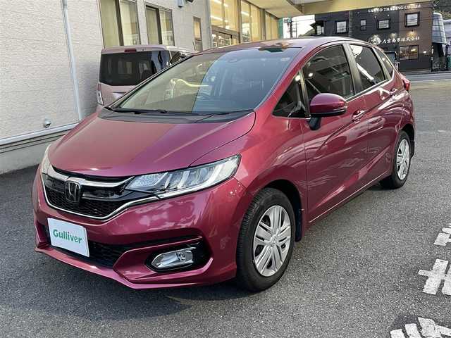 ホンダ フィット 13G L ホンダセンシング 静岡県 2018(平30)年 5.6万km ルージュアメジストM ワンオーナー/純正ナビ/フルセグTV/DVD/CD/BT/SD/MSV/USB/バックカメラ/衝突軽減ブレーキ/レーンキープアシスト/レーダークルーズコントロール/ビルトインETC/ステアリングスイッチ/前方ドライブレコーダー/LEDヘッドライト/LEDフォグライト/スマートキー×2/保証書/取扱説明書/ナビ取扱説明書/H31/R2/3/5/7点検記録簿有