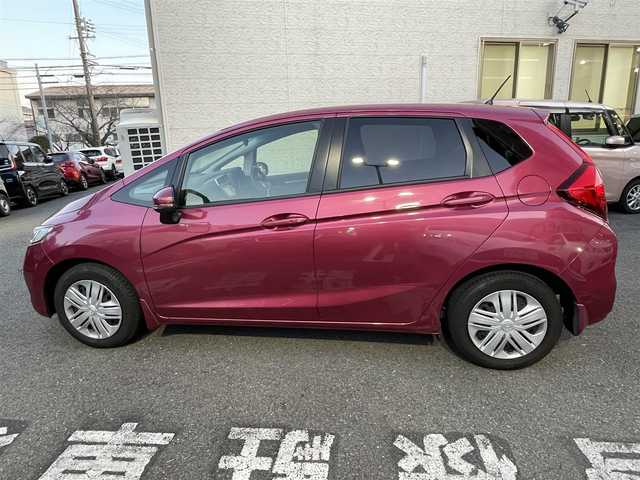 ホンダ フィット 13G L ホンダセンシング 静岡県 2018(平30)年 5.6万km ルージュアメジストM ワンオーナー/純正ナビ/フルセグTV/DVD/CD/BT/SD/MSV/USB/バックカメラ/衝突軽減ブレーキ/レーンキープアシスト/レーダークルーズコントロール/ビルトインETC/ステアリングスイッチ/前方ドライブレコーダー/LEDヘッドライト/LEDフォグライト/スマートキー×2/保証書/取扱説明書/ナビ取扱説明書/H31/R2/3/5/7点検記録簿有