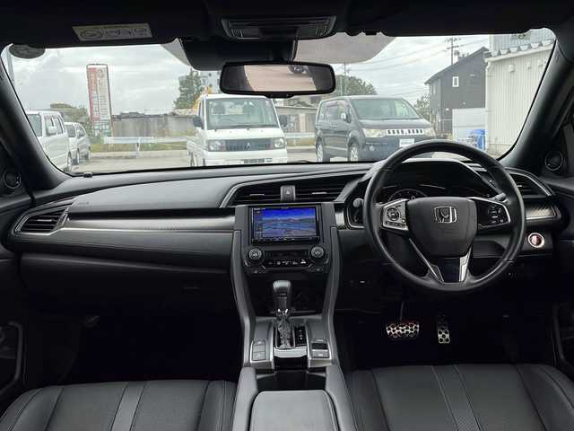 ホンダ シビック ハッチバック 山形県 2019(令1)年 2.6万km クリスタルブラックパール レザーインテリア（MOP）/ホンダセンシング　/　・衝突軽減ブレーキ/　・路外逸脱抑制機能/　・渋滞追従機能付きアダブティブクルーズコントロール/　・標識認識機能/ワーク（WORK）19インチアルミホイール/　（ＬＡＮＶＥＣ　ＬＳ１）/LEDヘッドライト　/運転席８Ｗａｙパワーシート　/クルーズコントロール/社外ナビ/TV/バックカメラ/ETC