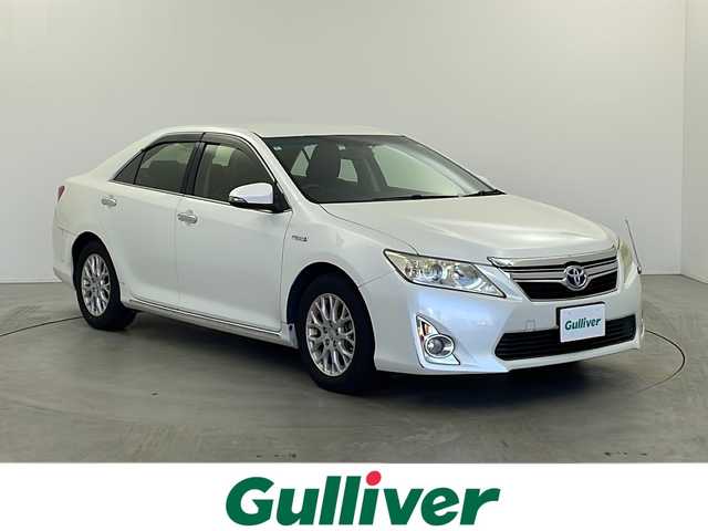 トヨタ カムリ ハイブリット 栃木県 2013(平25)年 18万km ホワイトパールクリスタルシャイン 純正ナビ/（BT/フルセグ/CD/DVD/AM/FM)/横滑り防止/ドライブレコーダー/プッシュスタート/スマートキー/純正アルミホイール/純正フロアマット/電動格納ミラー