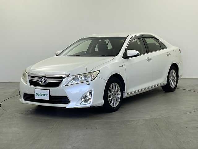 トヨタ カムリ ハイブリット 栃木県 2013(平25)年 18万km ホワイトパールクリスタルシャイン 純正ナビ/（BT/フルセグ/CD/DVD/AM/FM)/横滑り防止/ドライブレコーダー/プッシュスタート/スマートキー/純正アルミホイール/純正フロアマット/電動格納ミラー
