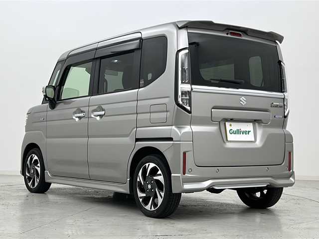 スズキ スペーシア カスタム HYBRID XS 宮城県 2024(令6)年 0.7万km スチールシルバーM 禁煙車/全方位モニター/スズキセーフティサポート/・デュアルセンサーブレーキサポートII/・車線逸脱警報/・アダプティブクルーズコントロール/・オートハイビームアシスト/・ヘッドアップディスプレイ/スズキコネクト9インチナビ/・CD.DVD.BT.USB/フルセグTV/両側パワースライドドア/ハーフレザーシート/前席シートヒーター/後席オットマン/LEDヘッドライト/LEDフォグランプ/ステアリングヒーター/ステアリングスイッチ/電動パーキングブレーキ/オートホールド機能/プッシュスタート/スマートキー/純正15インチアルミホイール/純正フロアマット/ロールサンシェード/シートバックテーブル