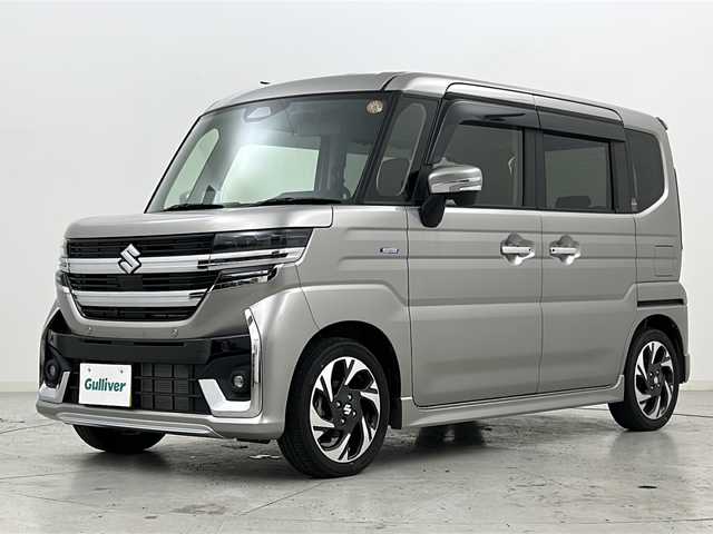 スズキ スペーシア カスタム HYBRID XS 宮城県 2024(令6)年 0.7万km スチールシルバーM 禁煙車/全方位モニター/スズキセーフティサポート/・デュアルセンサーブレーキサポートII/・車線逸脱警報/・アダプティブクルーズコントロール/・オートハイビームアシスト/・ヘッドアップディスプレイ/スズキコネクト9インチナビ/・CD.DVD.BT.USB/フルセグTV/両側パワースライドドア/ハーフレザーシート/前席シートヒーター/後席オットマン/LEDヘッドライト/LEDフォグランプ/ステアリングヒーター/ステアリングスイッチ/電動パーキングブレーキ/オートホールド機能/プッシュスタート/スマートキー/純正15インチアルミホイール/純正フロアマット/ロールサンシェード/シートバックテーブル