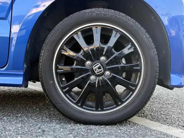 ホンダ Ｎ ＢＯＸ カスタム G ターボ Lパッケージ 石川県 2015(平27)年 4.7万km ブリリアントスポーティブルーメタリック2トーン ・ディーラー点検記録H28:29:30:31:R2:3:4:5:7年有り　/・ワンオーナー　/・４WD/・ターボ車両/・両側パワースライドドア　/・黒ハーフレザーシート　/・オートライト　/・HIDヘットライト　/・LEDフォグライト　/・2列目ロールサンシェード/・純正ワンセグTV/・バックカメラ/・クルーズコントロール/・オートリトラクタブミラー/・ウインカーミラー/・純正15インチアルミ/・ブリジストンタイヤ/・スマートキー×２/・プッシュスタート/・保証書/・取説