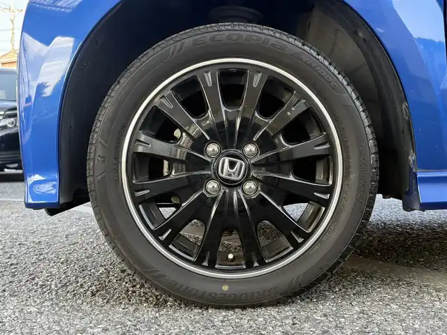 ホンダ Ｎ ＢＯＸ カスタム G ターボ Lパッケージ 石川県 2015(平27)年 4.7万km ブリリアントスポーティブルーメタリック2トーン ・ディーラー点検記録H28:29:30:31:R2:3:4:5:7年有り　/・ワンオーナー　/・４WD/・ターボ車両/・両側パワースライドドア　/・黒ハーフレザーシート　/・オートライト　/・HIDヘットライト　/・LEDフォグライト　/・2列目ロールサンシェード/・純正ワンセグTV/・バックカメラ/・クルーズコントロール/・オートリトラクタブミラー/・ウインカーミラー/・純正15インチアルミ/・ブリジストンタイヤ/・スマートキー×２/・プッシュスタート/・保証書/・取説