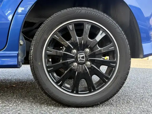 ホンダ Ｎ ＢＯＸ カスタム G ターボ Lパッケージ 石川県 2015(平27)年 4.7万km ブリリアントスポーティブルーメタリック2トーン ・ディーラー点検記録H28:29:30:31:R2:3:4:5:7年有り　/・ワンオーナー　/・４WD/・ターボ車両/・両側パワースライドドア　/・黒ハーフレザーシート　/・オートライト　/・HIDヘットライト　/・LEDフォグライト　/・2列目ロールサンシェード/・純正ワンセグTV/・バックカメラ/・クルーズコントロール/・オートリトラクタブミラー/・ウインカーミラー/・純正15インチアルミ/・ブリジストンタイヤ/・スマートキー×２/・プッシュスタート/・保証書/・取説