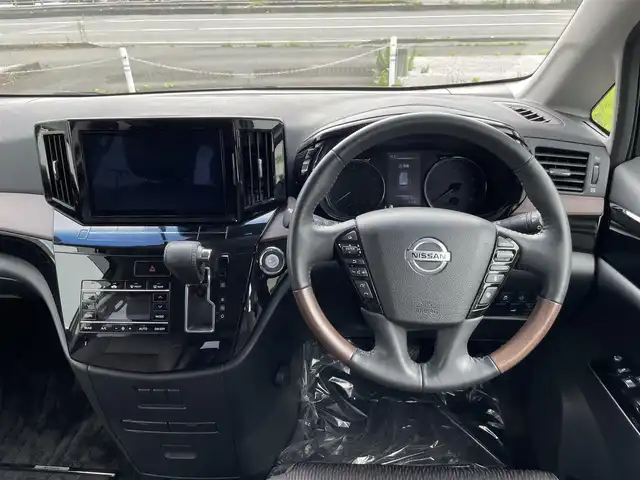 日産 エルグランド 250HWS S アーバンクロム 愛媛県 2021(令3)年 4.5万km ワイン 純正ナビ/Bluetooth/CD/DVD/Blu-ray/フルセグTV/フリップダウンモニター/追従クルコン/電動リアゲート/両側パワースライドドア/前方ドラレコ/バックカメラ/全方位カメラ/コーナーセンサー/純正フロアマット/純正18インチアルミホイール/ETC/USB/LEDオートライト
