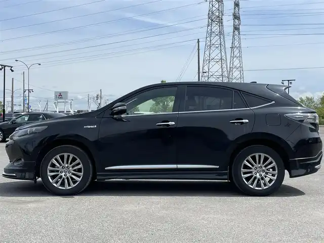 トヨタ ハリアー ハイブリッド プレミアム アドバンスドP 道央・札幌 2014(平26)年 11.4万km ブラック ４WD/JBLプレミアムサウンドシステム/モデリスタエアロ/純正ディーラーOPナビ/CD/DVD/BT/フルセグ/プリクラッシュセーフティ/横滑り防止装置/レーダークルーズコントロール/レーンキープアシスト/クリアランスソナー/パノラミックビューモニター/ビルトインETC/EVMODE/ECOMODE/パワーバックドア/D席パワーシート/ハーフレザーシート/革巻きウッドコンビステアリング/ステアリングリモコン/自動防眩ミラー/置くだけ充電/MTモード付AT/プッシュスタート/スマートキー/LEDヘッドライト/オートライト/オートハイビーム/フォグランプ/電動格納ミラー/ウィンカーミラー/純正フロアマット