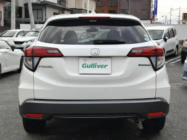 ホンダ ヴェゼル ハイブリッド 熊本県 2014(平26)年 9.7万km ホワイトオーキッドパール 純正ナビ/【フルセグTV/Bluetooth/CD/DVD】/バックカメラ/クルーズコントロール/プッシュスタート/スマートキー/ウィンカーミラー/ブレーキホールド/ステアリングスイッチ/ドライブレコーダー/ビルトインETC/横滑り防止装置/ABS/盗難防止装置/保証書/スペアキー