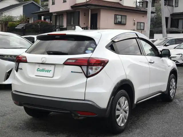 ホンダ ヴェゼル ハイブリッド 熊本県 2014(平26)年 9.7万km ホワイトオーキッドパール 純正ナビ/【フルセグTV/Bluetooth/CD/DVD】/バックカメラ/クルーズコントロール/プッシュスタート/スマートキー/ウィンカーミラー/ブレーキホールド/ステアリングスイッチ/ドライブレコーダー/ビルトインETC/横滑り防止装置/ABS/盗難防止装置/保証書/スペアキー