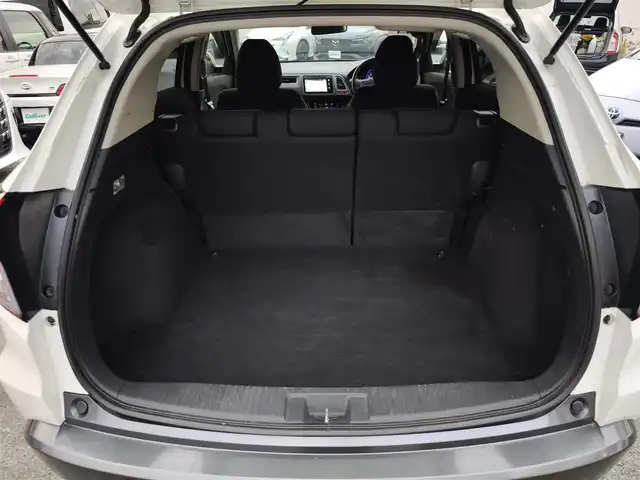 ホンダ ヴェゼル ハイブリッド 熊本県 2014(平26)年 9.7万km ホワイトオーキッドパール 純正ナビ/【フルセグTV/Bluetooth/CD/DVD】/バックカメラ/クルーズコントロール/プッシュスタート/スマートキー/ウィンカーミラー/ブレーキホールド/ステアリングスイッチ/ドライブレコーダー/ビルトインETC/横滑り防止装置/ABS/盗難防止装置/保証書/スペアキー