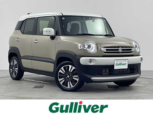 スズキ クロスビー HYBRID MZ 愛知県 2024(令6)年 1.8万km キャラバンアイボリーパールメタリック/ホワイト 2トーンルーフ 純正ナビ【CN-HZ8A5】/全方位カメラ/フルセグTV・Bluetooth・CD・DVD・USB/純正16インチアルミホイール/ＥＴＣ/ドライブレコーダー/SUZUKI Safety Support/デュアルカメラブレーキサポート/後退時ブレーキサポート/衝突被害軽減ブレーキ/誤発進抑制/後方誤発進抑制/車線維持支援/車線逸脱警報/ふらつき警報/アダプティブクルーズコントロール/先行車発進お知らせ/ヒルホールドコントロール/横滑り防止/アイドリングストップ/ハイビームアシスト/LEDヘッドライト/ファブリックシート/前席シートヒーター/革巻きステアリング/パドルシフト/フロアマット/プッシュスタート/スマートキー/スペアキー1本/保証書/取扱説明書・ナビ説明書