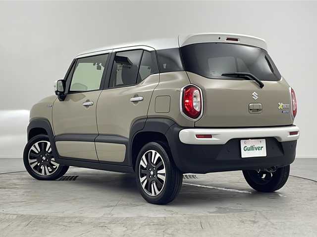 スズキ クロスビー HYBRID MZ 愛知県 2024(令6)年 1.8万km キャラバンアイボリーパールメタリック/ホワイト 2トーンルーフ 純正ナビ【CN-HZ8A5】/全方位カメラ/フルセグTV・Bluetooth・CD・DVD・USB/純正16インチアルミホイール/ＥＴＣ/ドライブレコーダー/SUZUKI Safety Support/デュアルカメラブレーキサポート/後退時ブレーキサポート/衝突被害軽減ブレーキ/誤発進抑制/後方誤発進抑制/車線維持支援/車線逸脱警報/ふらつき警報/アダプティブクルーズコントロール/先行車発進お知らせ/ヒルホールドコントロール/横滑り防止/アイドリングストップ/ハイビームアシスト/LEDヘッドライト/ファブリックシート/前席シートヒーター/革巻きステアリング/パドルシフト/フロアマット/プッシュスタート/スマートキー/スペアキー1本/保証書/取扱説明書・ナビ説明書