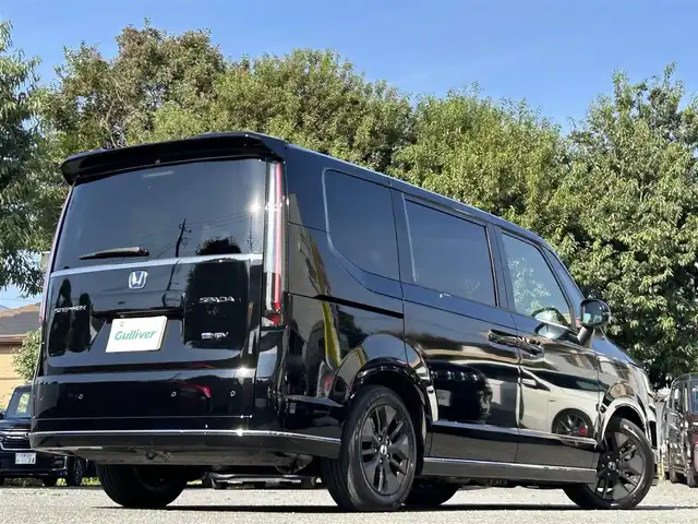 ホンダ ステップワゴン スパーダ eHEV 東京都 2024(令6)年 0.9万km クリスタルブラックパール ワンオーナー/純正9インチナビ/フルセグTV/Bluetoothオーディオ/DVD再生/バックカメラ/ビルトインETC/ナビ連動ドライブレコーダー/(DRH-229ND)/両側パワースライドドア/パワーバックドア/ハーフレザーシート/Honda SENSING