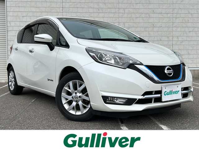日産 ノート e－パワー メダリスト 新潟県 2017(平29)年 6.2万km ブリリアントホワイトパール 純正ナビ【ワンセグTV/FM・AM/BT】/衝突軽減/バックカメラ/ドライブレコーダー/ETC/LEDヘッドライト/オートライト/横滑り防止/革巻きステアリング/ステアリングスイッチ/プッシュスタート/スマートキー/純正アルミホイール/純正フロアマット