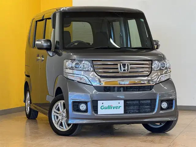 ホンダ Ｎ ＢＯＸ カスタム G Lパッケージ 群馬県 2013(平25)年 6.5万km ポリッシュドメタルメタリック パワースライドドア/純正オーディオ/　　CD/AUX/AM/FM/HIDオートライト/フォグランプ/純正14インチAW/ステアリングスイッチ/オートエアコン/ドアバイザー/横滑り防止機能/スマートキー/ETC