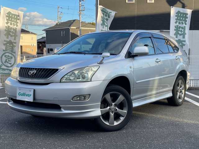 トヨタ ハリアー 240G プレミアム Lパッケージ 三重県 2010(平22)年 10.1万km シルバーM 登録時走行距離　１００３４２ｋｍ/ワンオーナー/禁煙車/黒革/社外ナビ（アルパイン）/AM/FM/CD/DVD/TV/フルセグテレビ/ETC/シートヒーター/バックカメラ/フロントカメラ/パワーステアリング/パワーウィンドウ/AUTOライト/AUTOエアコン/純正フロアマット/純正アルミホイール/電挌ミラー