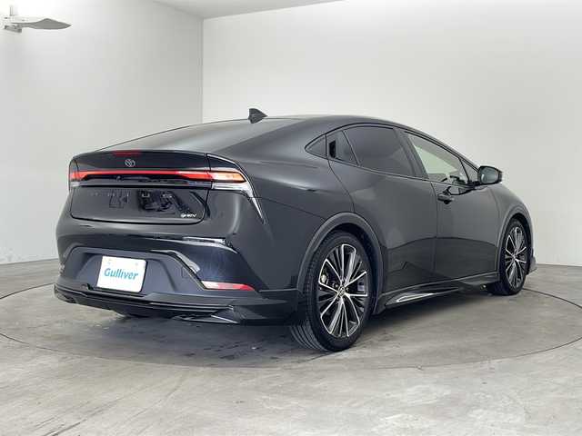 トヨタ プリウス G 兵庫県 2023(令5)年 0.9万km アティチュードブラックマイカ ・モデリスタエアロ（F、S、R）/・8インチナビ/USB/TV/Miracast/HDMI/・パノラミックビューモニター/・ビルトインETC2.0/・AC100V電源/・社外レーダー探知機/・前後ドライブレコーダー/・前席シートヒーター/・Toyota　Safety　Sense/・プリクラッシュセーフティ/・レーントレーシングアシスト/・レーンディパーチャーアラート/・レーダークルーズコントロール/・オートマチックハイビーム/・ロードサインアシスト/・ドライバー異常時対応システム/・プロアクティブドライビングアシスト/・発進遅れ告知機能/・ブラインドスポットモニター/・後方車両接近告知/・リヤカメラディテクション/・安心降車アシスト/・周辺車両接近時サポート/・ＬＥＤヘッドライト/・ウインカー付きドアミラー/・純正フロアマット/・純正１９インチアルミホイール/・スマートキー/・プッシュスタート
