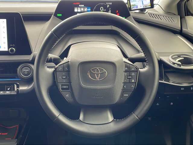 トヨタ プリウス G 兵庫県 2023(令5)年 0.9万km アティチュードブラックマイカ ・モデリスタエアロ（F、S、R）/・8インチナビ/USB/TV/Miracast/HDMI/・パノラミックビューモニター/・ビルトインETC2.0/・AC100V電源/・社外レーダー探知機/・前後ドライブレコーダー/・前席シートヒーター/・Toyota　Safety　Sense/・プリクラッシュセーフティ/・レーントレーシングアシスト/・レーンディパーチャーアラート/・レーダークルーズコントロール/・オートマチックハイビーム/・ロードサインアシスト/・ドライバー異常時対応システム/・プロアクティブドライビングアシスト/・発進遅れ告知機能/・ブラインドスポットモニター/・後方車両接近告知/・リヤカメラディテクション/・安心降車アシスト/・周辺車両接近時サポート/・ＬＥＤヘッドライト/・ウインカー付きドアミラー/・純正フロアマット/・純正１９インチアルミホイール/・スマートキー/・プッシュスタート