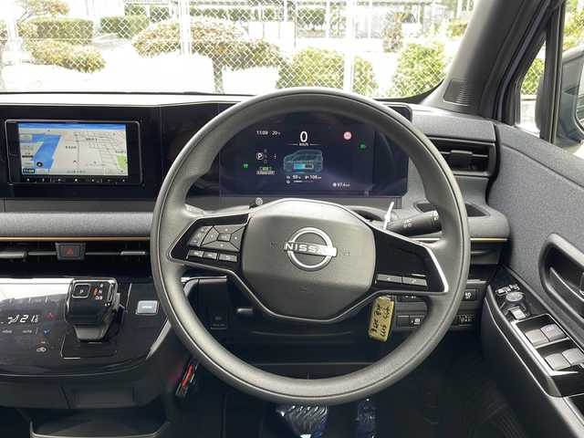 日産 サクラ X 90周年記念車 山口県 2024(令6)年 0.4万km 青 禁煙車/電気自動車/社外SDナビ【AVIC-RW821-D】/　Bluetooth、CD、DVD、FM・AMラジオ、フルセグTV/全方位カメラ/バックカメラ/プロパイロット/ドライブレコーダー/ETC/ステアリングスイッチ/レザーシート/純正フロアマット/純正14インチアルミホイール/プッシュスタート/スマートキー/スペアキー/パーキングアシスト/エマージェンシーブレーキ/先行車発進お知らせ/レーンキープアシスト/盗難防止装置